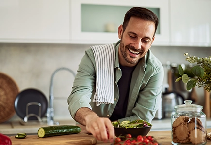 Person Cooking With Fresh Vegetables for Preventive Medicine & Preventative Primary Care/Preventative Care Management Program