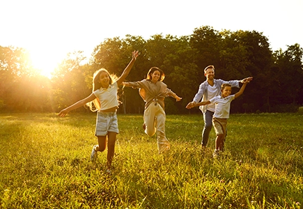 Family With Pediatric Direct Primary Care Children Playing Outside