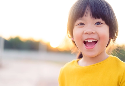 Pediatric Direct Primary Care Child Smiling Outside